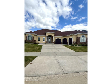 Coming soon! Beautiful floor plan with versatile spaces and all on Bishops Bay Country Club in Wisconsin - for sale on GolfHomes.com, golf home, golf lot