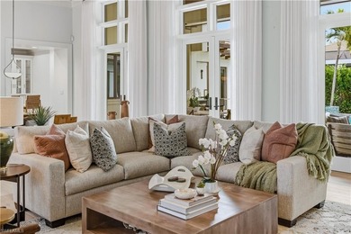 Discover elevated coastal living in this south-facing Moorings on The Moorings Country Club in Florida - for sale on GolfHomes.com, golf home, golf lot