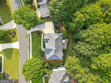 Beautifully situated BridgeMill home less than 1 mile from the on Bridgemill Golf Club in Georgia - for sale on GolfHomes.com, golf home, golf lot