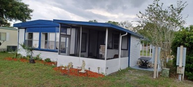 Come settle down and relax in a beautiful, manufactured home on Fairways Country Club in Florida - for sale on GolfHomes.com, golf home, golf lot