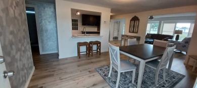 Come settle down and relax in a beautiful, manufactured home on Fairways Country Club in Florida - for sale on GolfHomes.com, golf home, golf lot