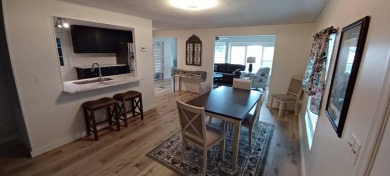 Come settle down and relax in a beautiful, manufactured home on Fairways Country Club in Florida - for sale on GolfHomes.com, golf home, golf lot