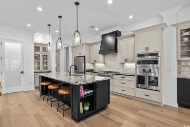Experience refined living in this immaculate custom estate on Grande Dunes Golf Club in South Carolina - for sale on GolfHomes.com, golf home, golf lot