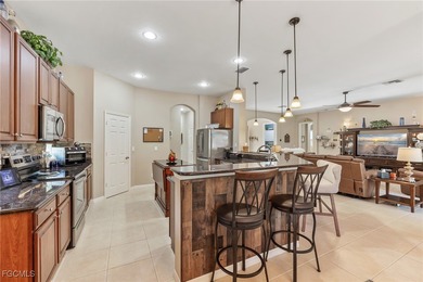 Welcome Home is How You'll Feel in this Immaculate 4 Bedroom, 2 on Gateway Golf and Country Club in Florida - for sale on GolfHomes.com, golf home, golf lot