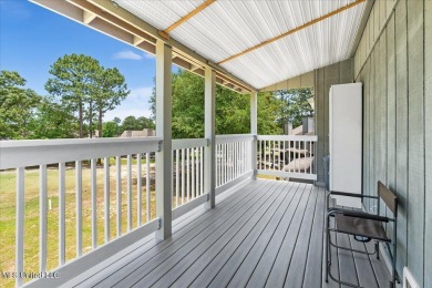 Welcome to this stunning 2-bedroom, 2.5-bathroom townhouse on Diamondhead Country Club in Mississippi - for sale on GolfHomes.com, golf home, golf lot