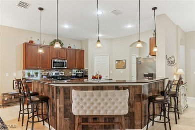 Welcome Home is How You'll Feel in this Immaculate 4 Bedroom, 2 on Gateway Golf and Country Club in Florida - for sale on GolfHomes.com, golf home, golf lot