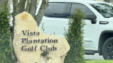 AFFORDABLE LIVING IN DESIRABLE VISTA PLANTATION across from on Vista Plantation Golf Club in Florida - for sale on GolfHomes.com, golf home, golf lot