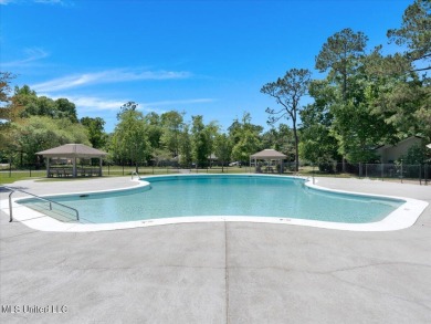 Welcome to this stunning 2-bedroom, 2.5-bathroom townhouse on Diamondhead Country Club in Mississippi - for sale on GolfHomes.com, golf home, golf lot