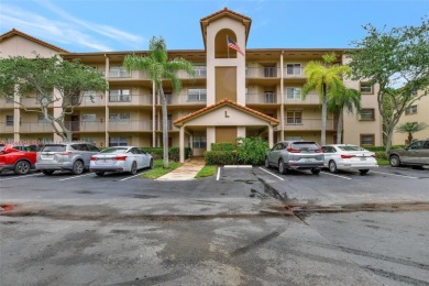 Top-floor corner unit and a breathtaking golf view with 1,507 SQ on Flamingo Lakes Country Club in Florida - for sale on GolfHomes.com, golf home, golf lot