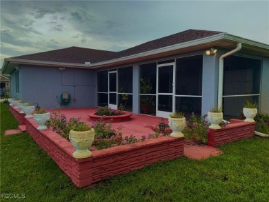 Charming Single-Family Home in Lehigh Acres - Spacious, Modern & on River Hall Country Club in Florida - for sale on GolfHomes.com, golf home, golf lot