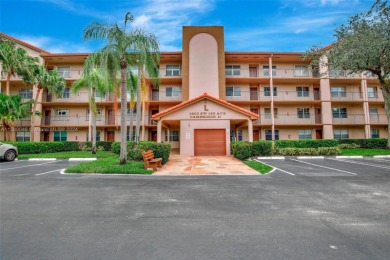 This top-floor corner unit boasts a well-maintained interior on Flamingo Lakes Country Club in Florida - for sale on GolfHomes.com, golf home, golf lot