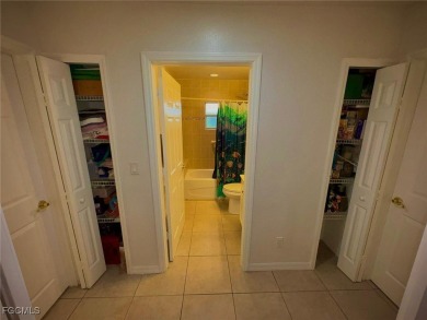 Charming Single-Family Home in Lehigh Acres - Spacious, Modern & on River Hall Country Club in Florida - for sale on GolfHomes.com, golf home, golf lot