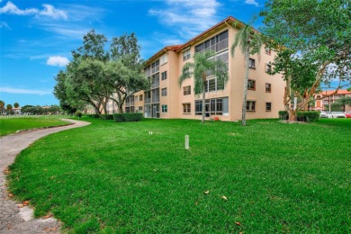 Top-floor corner unit and a breathtaking golf view with 1,507 SQ on Flamingo Lakes Country Club in Florida - for sale on GolfHomes.com, golf home, golf lot