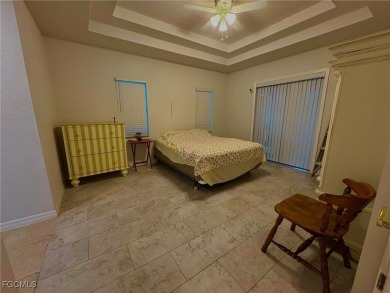 Charming Single-Family Home in Lehigh Acres - Spacious, Modern & on River Hall Country Club in Florida - for sale on GolfHomes.com, golf home, golf lot