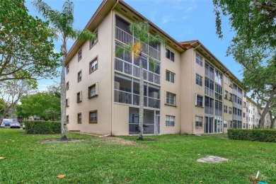 Top-floor corner unit with a breathtaking golf view and 1,507 SQ on Flamingo Lakes Country Club in Florida - for sale on GolfHomes.com, golf home, golf lot