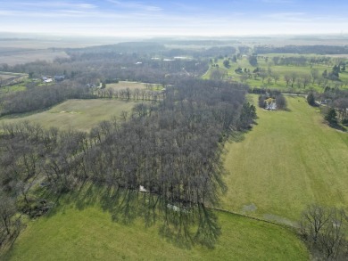 Nestled across from Minnee Monesse Golf Course, this 12-acre on Minne Monesse Golf Club in Illinois - for sale on GolfHomes.com, golf home, golf lot