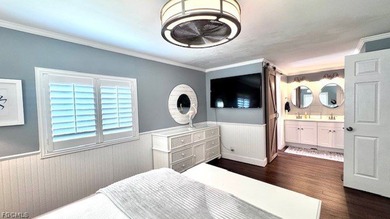 WATERFRONT HOME WITH BOAT DOCK/LIFT. Welcome to your dream home on Riverbend Golf and Country Club in Florida - for sale on GolfHomes.com, golf home, golf lot