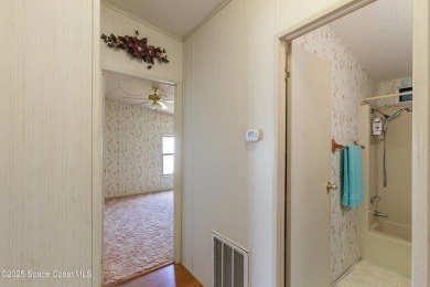 Welcome home to this mmaculate move-in-ready 2 bedroom 2 bath on Barefoot Bay Golf Course in Florida - for sale on GolfHomes.com, golf home, golf lot