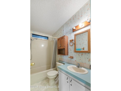 Welcome home to this mmaculate move-in-ready 2 bedroom 2 bath on Barefoot Bay Golf Course in Florida - for sale on GolfHomes.com, golf home, golf lot