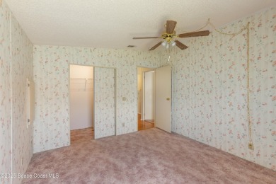 Welcome home to this mmaculate move-in-ready 2 bedroom 2 bath on Barefoot Bay Golf Course in Florida - for sale on GolfHomes.com, golf home, golf lot