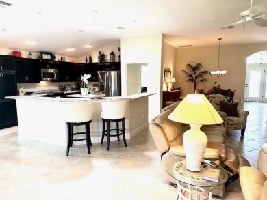 Expansive Ivy floorplan on a one of a kind oversized homesite on Egret Championship Golf Course in Florida - for sale on GolfHomes.com, golf home, golf lot