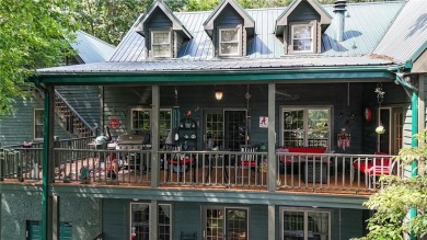 Experience ultimate privacy and breathtaking views from this on The Highlands Course at Lake Arrowhead in Georgia - for sale on GolfHomes.com, golf home, golf lot