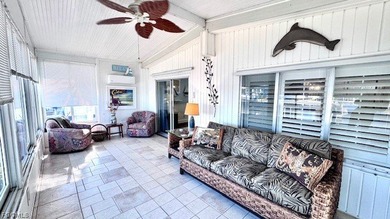 WATERFRONT HOME WITH BOAT DOCK/LIFT. Welcome to your dream home on Riverbend Golf and Country Club in Florida - for sale on GolfHomes.com, golf home, golf lot