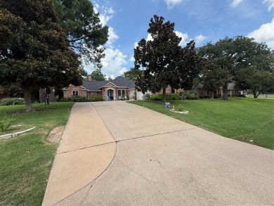 Located in the highly sought-after gated community of Pecan on Pecan Plantation Country Club in Texas - for sale on GolfHomes.com, golf home, golf lot