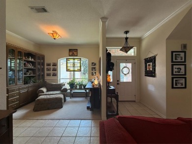 Located in the highly sought-after gated community of Pecan on Pecan Plantation Country Club in Texas - for sale on GolfHomes.com, golf home, golf lot