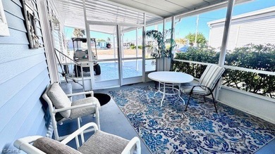 WATERFRONT HOME WITH BOAT DOCK/LIFT. Welcome to your dream home on Riverbend Golf and Country Club in Florida - for sale on GolfHomes.com, golf home, golf lot