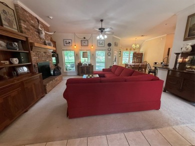 Located in the highly sought-after gated community of Pecan on Pecan Plantation Country Club in Texas - for sale on GolfHomes.com, golf home, golf lot
