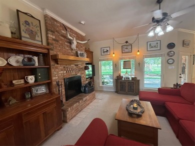 Located in the highly sought-after gated community of Pecan on Pecan Plantation Country Club in Texas - for sale on GolfHomes.com, golf home, golf lot