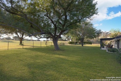 Welcome to your dream home nestled on the lush greens of Fair on Fair Oaks Ranch Golf and Country Club in Texas - for sale on GolfHomes.com, golf home, golf lot