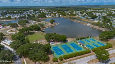 Welcome home to this mmaculate move-in-ready 2 bedroom 2 bath on Barefoot Bay Golf Course in Florida - for sale on GolfHomes.com, golf home, golf lot