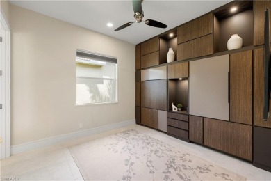 This fully renovated custom residence presents a rare on West Bay Beach and Golf Club in Florida - for sale on GolfHomes.com, golf home, golf lot