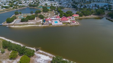 Welcome home to this mmaculate move-in-ready 2 bedroom 2 bath on Barefoot Bay Golf Course in Florida - for sale on GolfHomes.com, golf home, golf lot