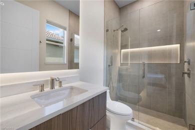 This fully renovated custom residence presents a rare on West Bay Beach and Golf Club in Florida - for sale on GolfHomes.com, golf home, golf lot