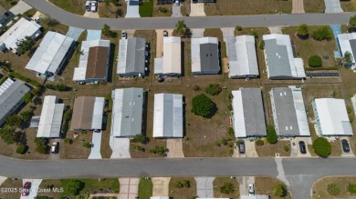 Welcome home to this mmaculate move-in-ready 2 bedroom 2 bath on Barefoot Bay Golf Course in Florida - for sale on GolfHomes.com, golf home, golf lot
