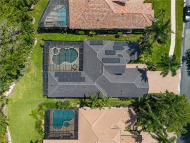 This fully renovated custom residence presents a rare on West Bay Beach and Golf Club in Florida - for sale on GolfHomes.com, golf home, golf lot