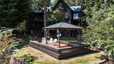 Experience ultimate privacy and breathtaking views from this on The Highlands Course at Lake Arrowhead in Georgia - for sale on GolfHomes.com, golf home, golf lot