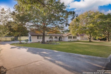 Welcome to your dream home nestled on the lush greens of Fair on Fair Oaks Ranch Golf and Country Club in Texas - for sale on GolfHomes.com, golf home, golf lot