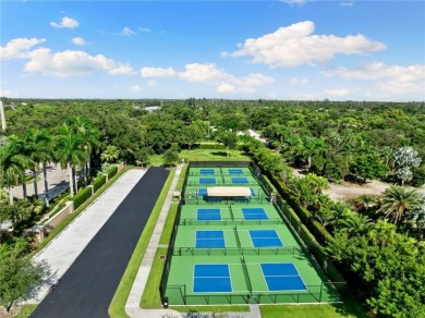 This fully renovated custom residence presents a rare on West Bay Beach and Golf Club in Florida - for sale on GolfHomes.com, golf home, golf lot