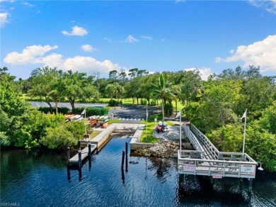 This fully renovated custom residence presents a rare on West Bay Beach and Golf Club in Florida - for sale on GolfHomes.com, golf home, golf lot