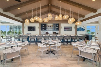 This fully renovated custom residence presents a rare on West Bay Beach and Golf Club in Florida - for sale on GolfHomes.com, golf home, golf lot