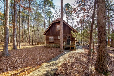 Adorable Cabin in the woods with red line behind the house and on Tannenbaum Golf Club in Arkansas - for sale on GolfHomes.com, golf home, golf lot