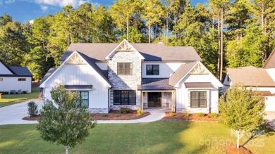 Stunning 2020 custom-built home located in The Palisades. This on The Palisades Country Club in North Carolina - for sale on GolfHomes.com, golf home, golf lot
