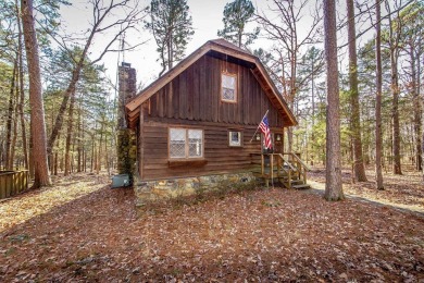 Adorable Cabin in the woods with red line behind the house and on Tannenbaum Golf Club in Arkansas - for sale on GolfHomes.com, golf home, golf lot