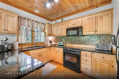 Discover the perfect lock-and-leave second home nestled right on on Trillium Links in North Carolina - for sale on GolfHomes.com, golf home, golf lot