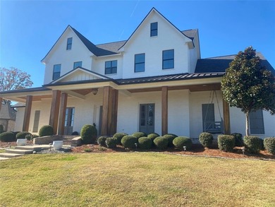 Welcome home to this beautiful modern farmhouse in the on Southern Trace Country Club in Louisiana - for sale on GolfHomes.com, golf home, golf lot