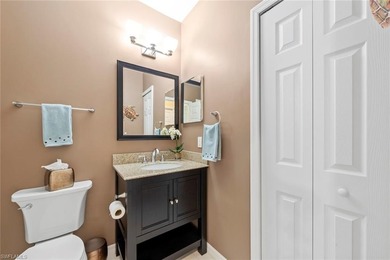 Experience effortless country club living in this beautifully on Estero Country Club in Florida - for sale on GolfHomes.com, golf home, golf lot